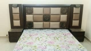 king size bed with side table and Dressing table