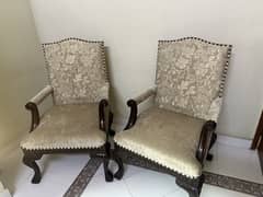 2 cushioned chairs