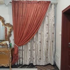 curtain and a blind