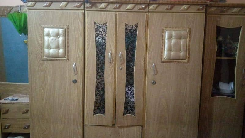3 door almaari divider and house hold furniture mirror and bed 0