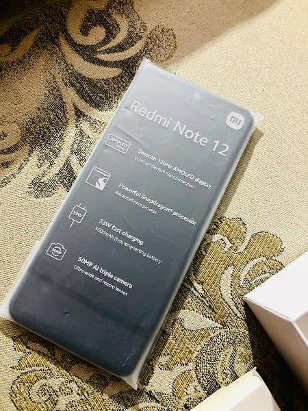 Redmi Note 12 8 GB Ram 128 GB Rom Charger Un use  10 month warranty 5