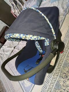 baby Carrey cot new condition blue color comfortable