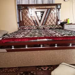 double bed with foam and bed sheet