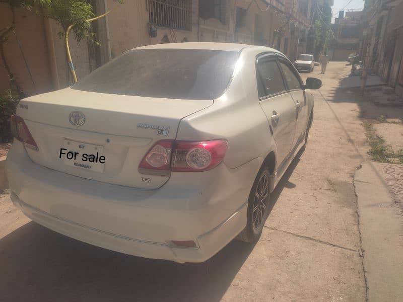 Toyota Corolla XLI 2010 islamabad nmbr 1