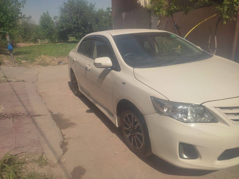 Toyota Corolla XLI 2010 islamabad nmbr 12