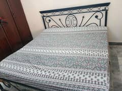 Iron bed with wall Mirror and wooden 3 door cupboard