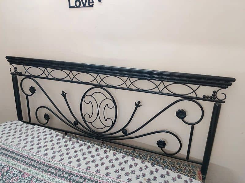Iron bed with wall Mirror and wooden 3 door cupboard 1