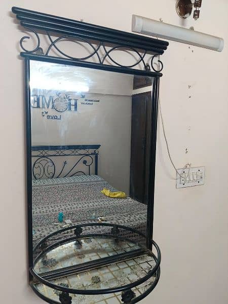Iron bed with wall Mirror and wooden 3 door cupboard 3