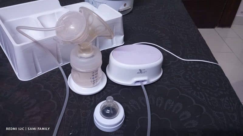 Philips electric breast pump like new with free Philips steriliser 1