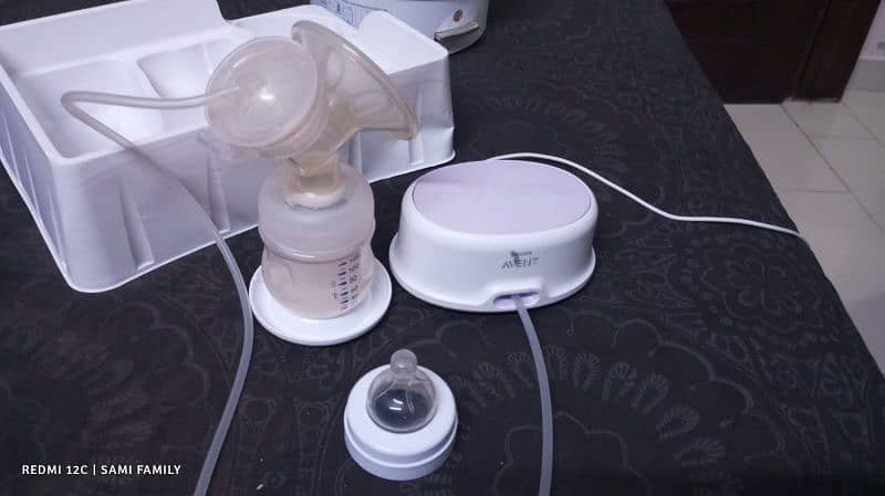 Philips electric breast pump like new with free Philips steriliser 4