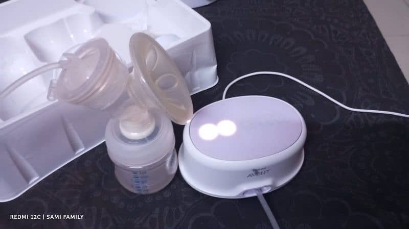 Philips electric breast pump like new with free Philips steriliser 6