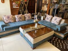 L shaped sofa and centre table