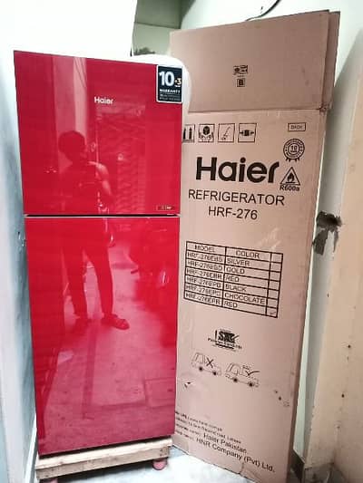 Almost new Haire Glass door fridge only 2 moth used 03095449689
