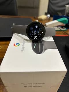 Google Pixel Watch with box and charger