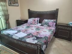 Double bed without mattress and dressing