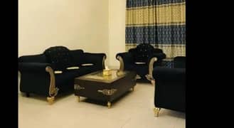 6 seater black sofa with golden work