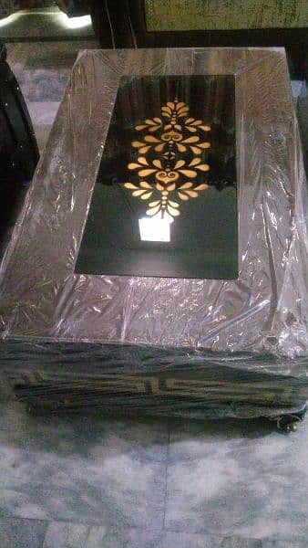 6 seater black sofa with golden work 3