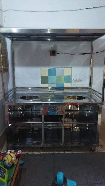 steel  counter with dishes 0