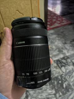 Canon camera efs 55-250mm is ii lens with image stabilization.