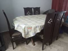 Dining table with 6 chairs brown colour