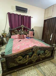 king size bed with mattress and  dressing table with  puffy/stool
