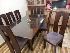 8 seater dinning table and showcase