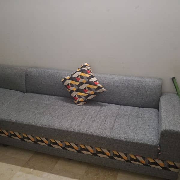 L shaped sofa with 7 cushions 1