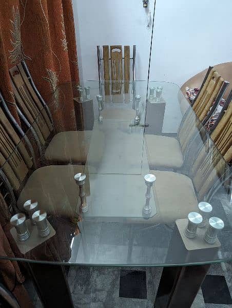 Glass dining table with six chairs 1