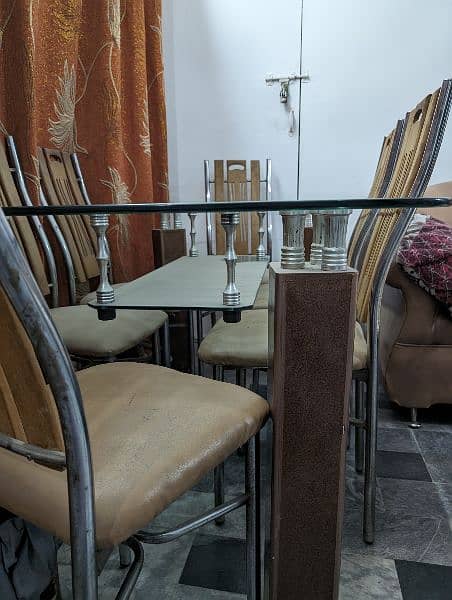 Glass dining table with six chairs 4
