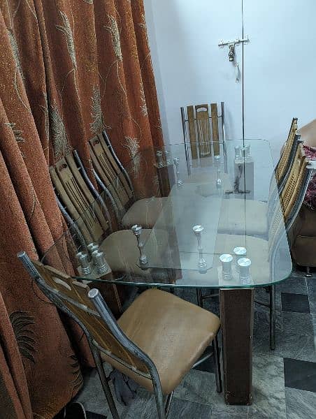 Glass dining table with six chairs 5