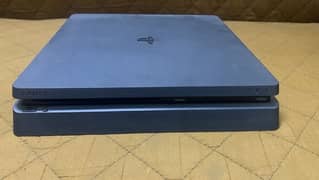 Playstation 4 slim 1 TB with two Games and two controllers