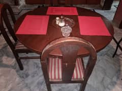 solid wood round dining table for 4 person but one chair is broken