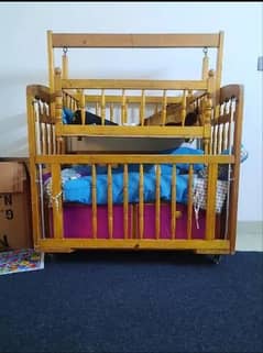 Baby sleeping Bed/Cot with Swing available in Excellent Condition