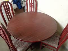 Wooden dinning with 4 chairs  & chairs ki poshish hony wali h baqi ok