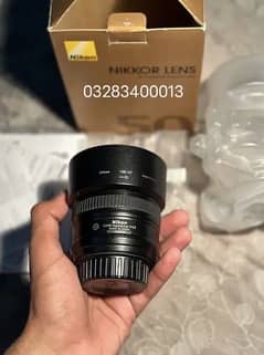 Nikon 50 mm 1.8g lense with box