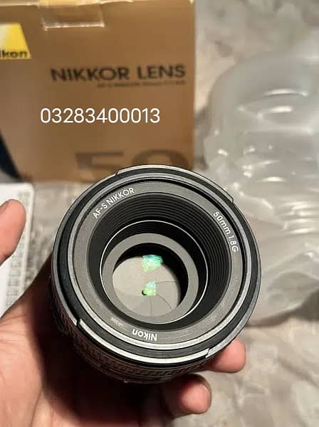Nikon 50 mm 1.8g lense with box 1