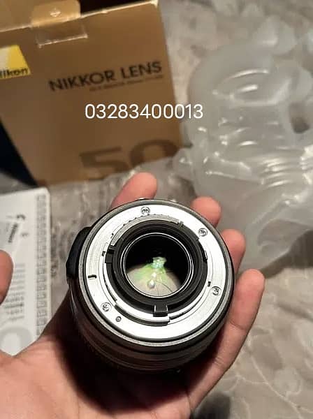 Nikon 50 mm 1.8g lense with box 3
