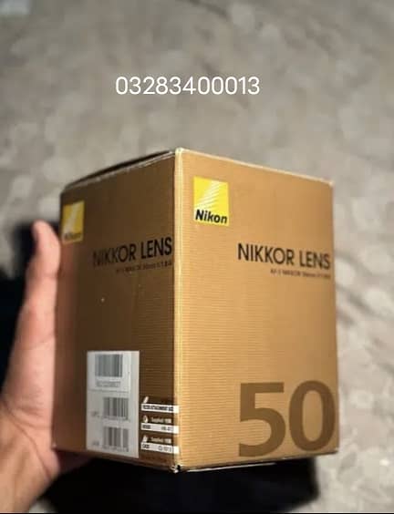 Nikon 50 mm 1.8g lense with box 4