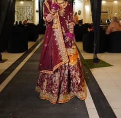 Heavy bridal dress in maroon color