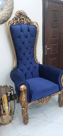 two wooden chairs with table dark blue colour velvet