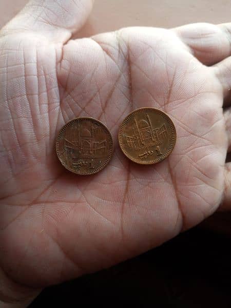 Old One Rupees coins 1