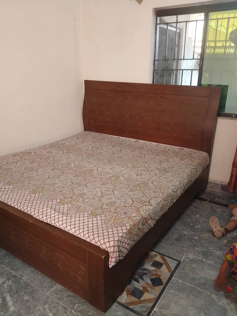 king size bed with mattress and side table 1