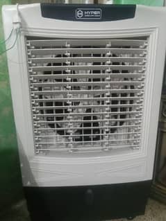 Air cooler new . . with warranty