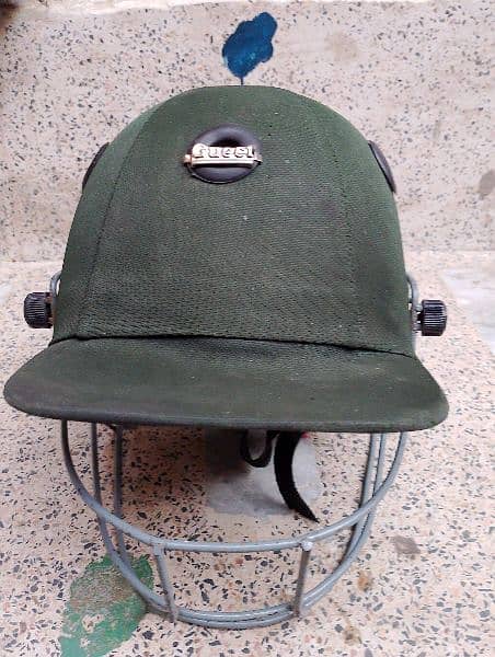 beautiful green cricket helmet 1