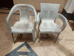 2 plastic chairs in smart condition