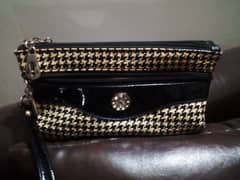 mini clutch with shoulder bag free. . . . imported (canada)