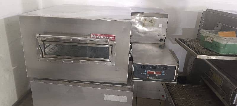 use pizza oven just Total original we hve new used fast food machinery 3