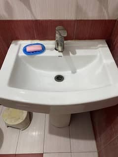 wash basin and commode