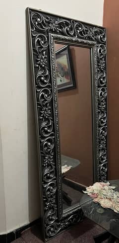 Two royal mirrors with heavy wooden frames for room, lounge decoration