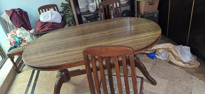 Wooden dining table with 6 foam chairs in good quality 1